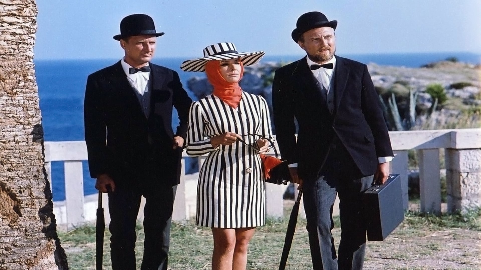 A. Bürger als "Madame" in einem Bormann-Kleid inklusive Tuch!